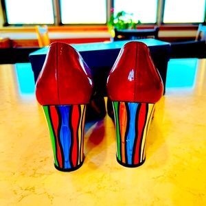 Stunning Stuart Weitzman “Daisy” Red Quasar Rainbow pumps